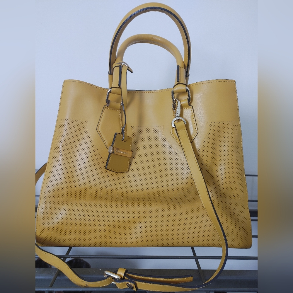 A. Bellucci handbag with Shoulder strap. Mustard color